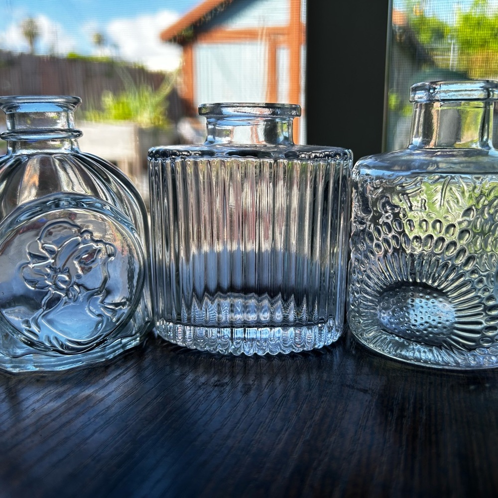 Set of Three Clear Glass Bottles
